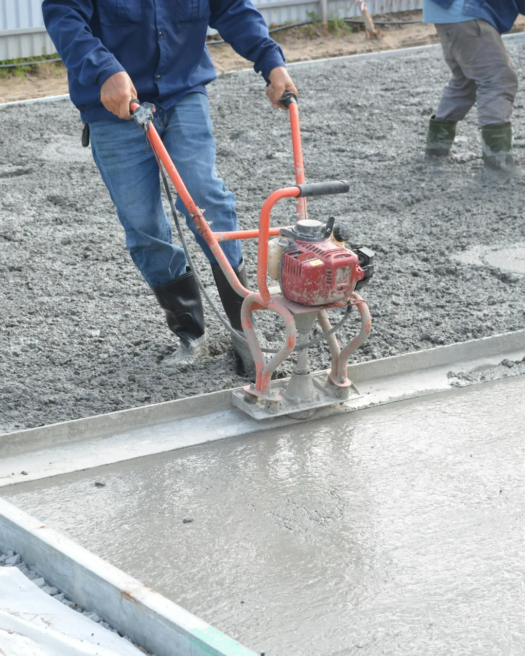 Concrete compacting on a prepared site