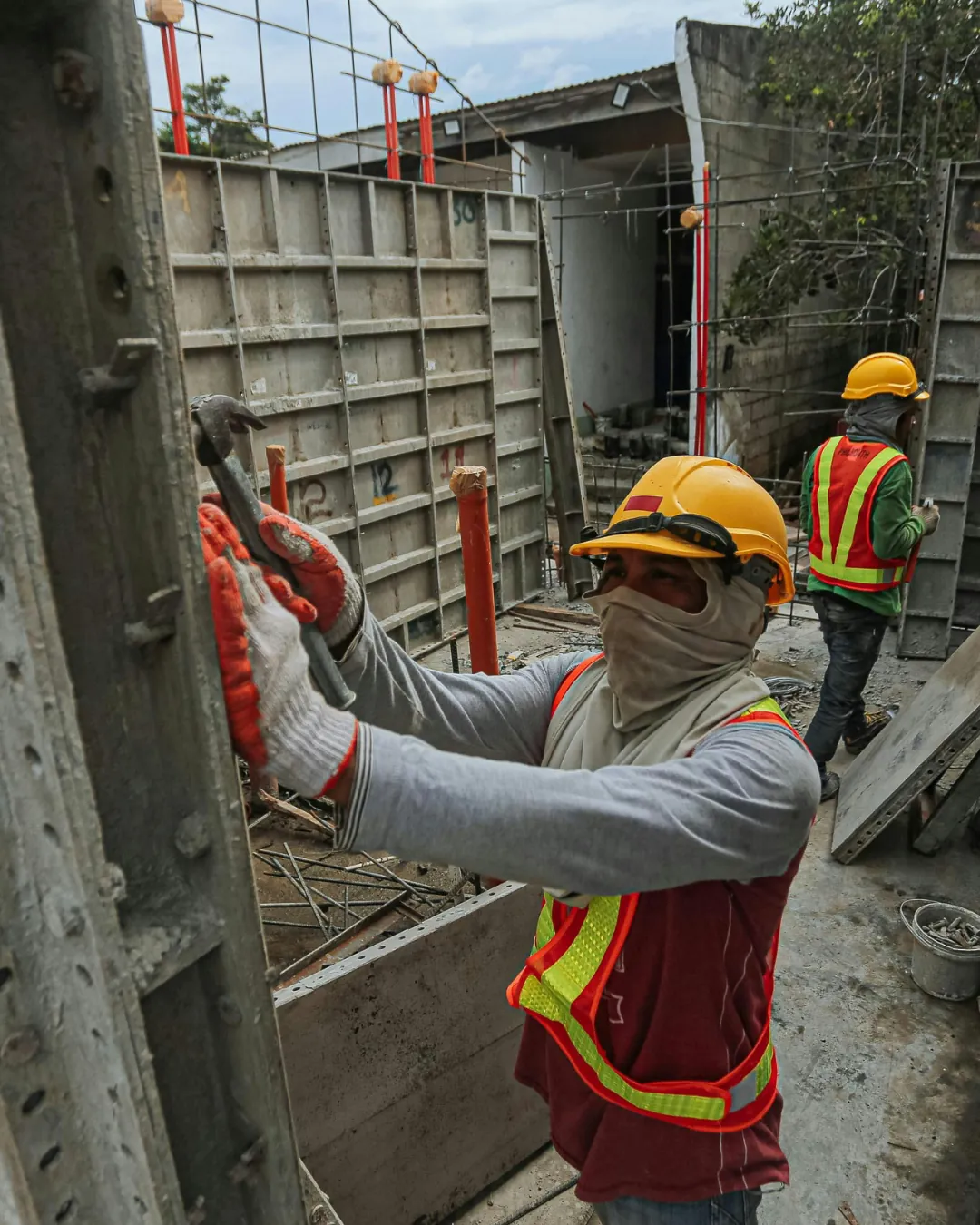 Worker doing masonry and concrete wall work